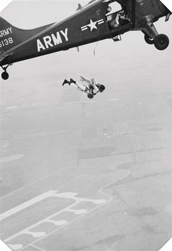 (WOLRD WAR II--FLIGHT) Album with 44 photographs apparently made by a WWII military skydiver,